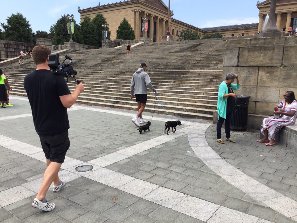 Athlete profile video being shot on Philadelphia Art Museum stairs
